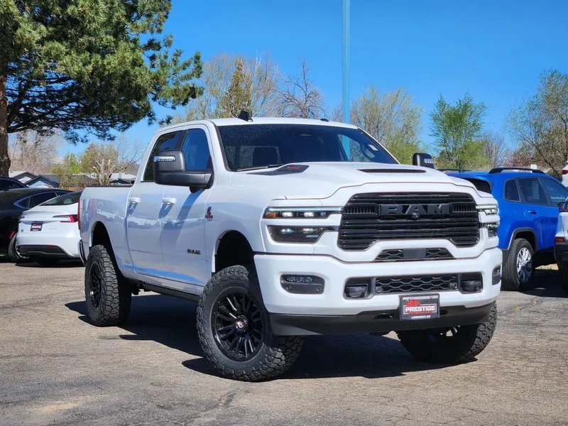 2025 RAM 2500 RAM 2500 LARAMIE CREW CAB 4X4 6'4' BOX in Bright White Clear-Coat Exterior Paint — front three-quarter view