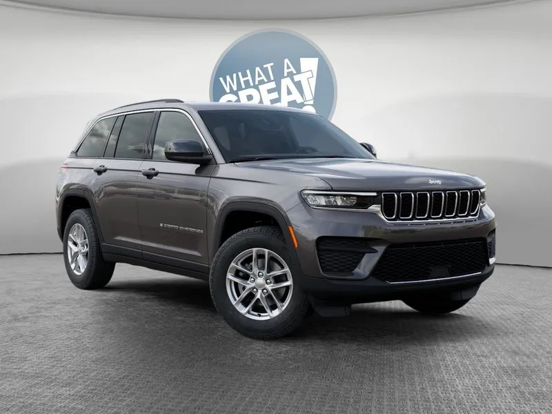 2026 Jeep Grand Cherokee Laredo X in Baltic Gray Metallic Clear-Coat Exterior Paint — front three-quarter view