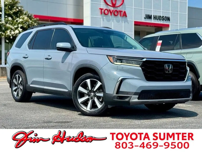 2024 Honda Pilot Touring in Diffused Sky Pearl — front three-quarter view