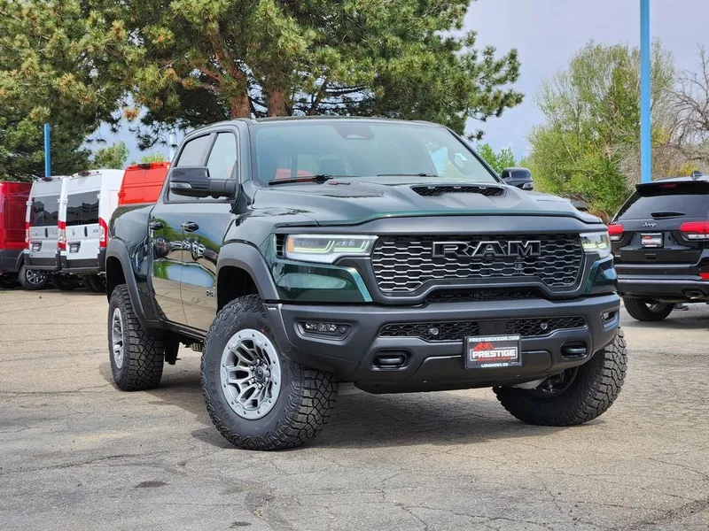 2026 RAM 1500 RAM 1500 RHO CREW CAB 4X4 5'7' BOX in Serrano-Green Metallic Exterior Paint — front three-quarter view