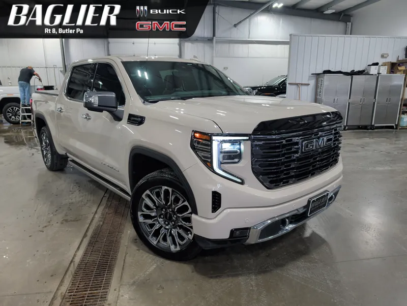 2026 GMC Sierra 1500 Denali Ultimate in Coastal Dune — front three-quarter view