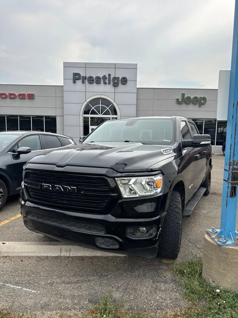 2019 RAM 1500 Big Horn/Lone Star Crew Cab 4x4 5'7' Box in Diamond Black Crystal Pearlcoat — front three-quarter view