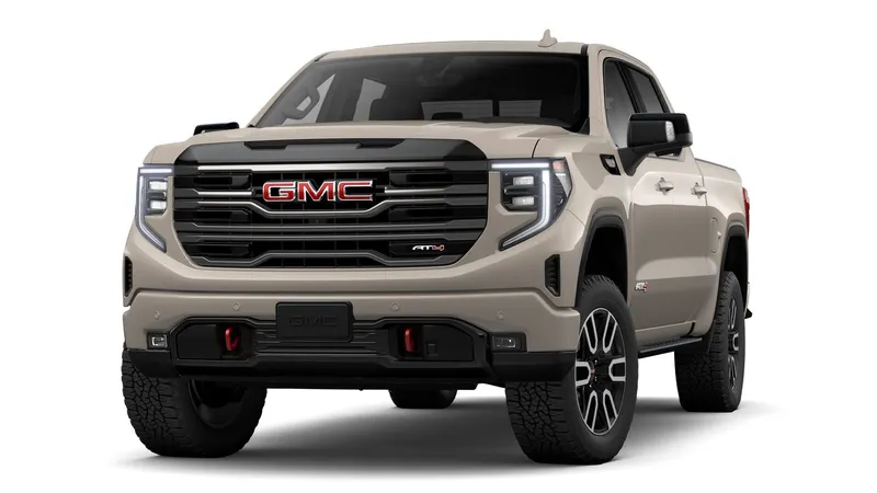 2026 GMC Sierra 1500 AT4 in Coastal Dune — front three-quarter view