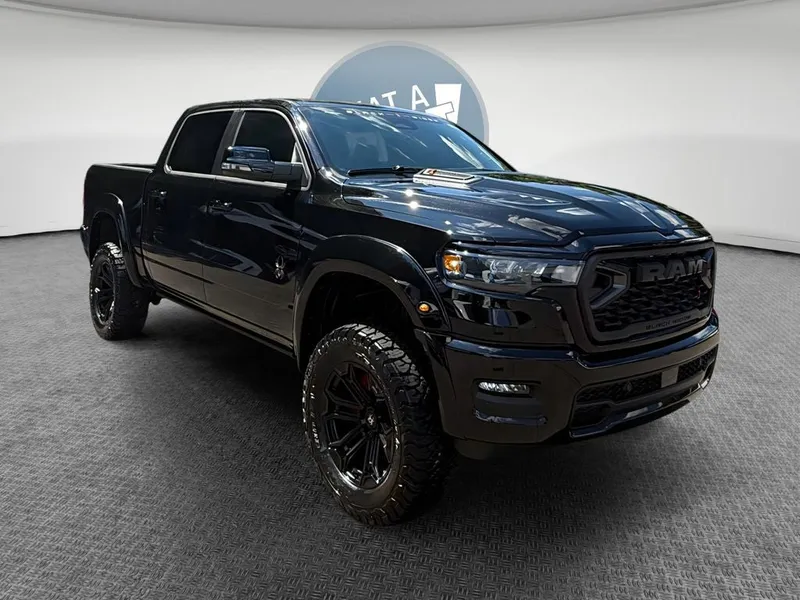 2026 RAM 1500 RAM 1500 BIG HORN CREW CAB 4X4 5'7' BOX in Diamond Black Crystal Pearl-Coat Exterior Paint — front three-quarter view