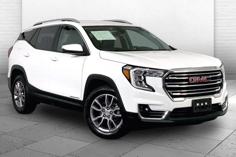2024 GMC Terrain SLT in Summit White — front three-quarter view
