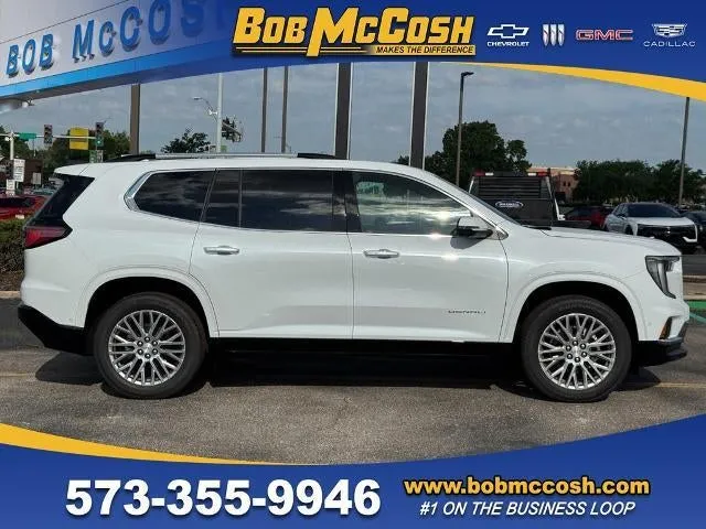 2026 GMC Acadia Denali in Glacier White Tricoat — front three-quarter view