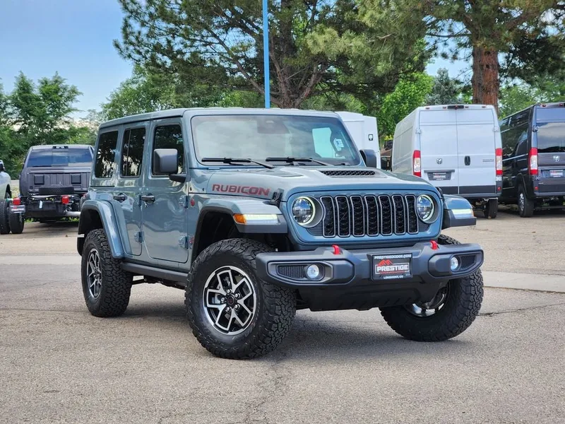 2026 Jeep Wrangler WRANGLER 4-DOOR RUBICON in Anvil Clear-Coat Exterior Paint — front three-quarter view