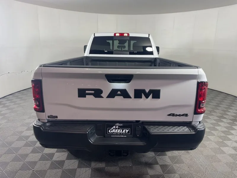 2026 RAM 2500 RAM 2500 TRADESMAN CREW CAB 4X4 8' BOX in Bright White Clear-Coat Exterior Paint — front three-quarter view