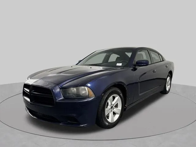 2013 Dodge Charger SE in Jazz Blue Pearlcoat — front three-quarter view