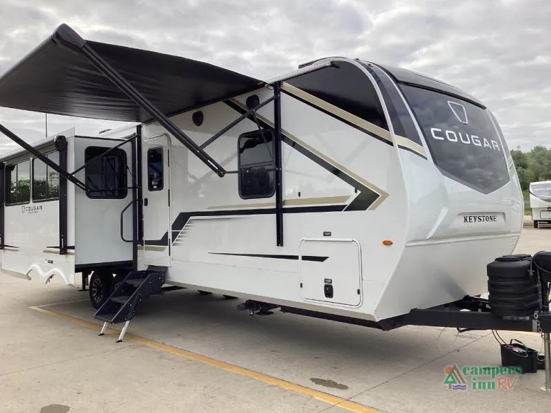 2027 Keystone RV Cougar Half-Ton in White Fog — front three-quarter view