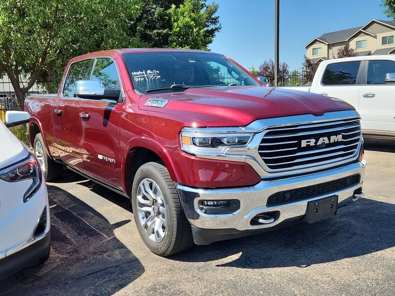 2019 RAM 1500 Laramie Longhorn in Delmonico Red Pearlcoat — front three-quarter view