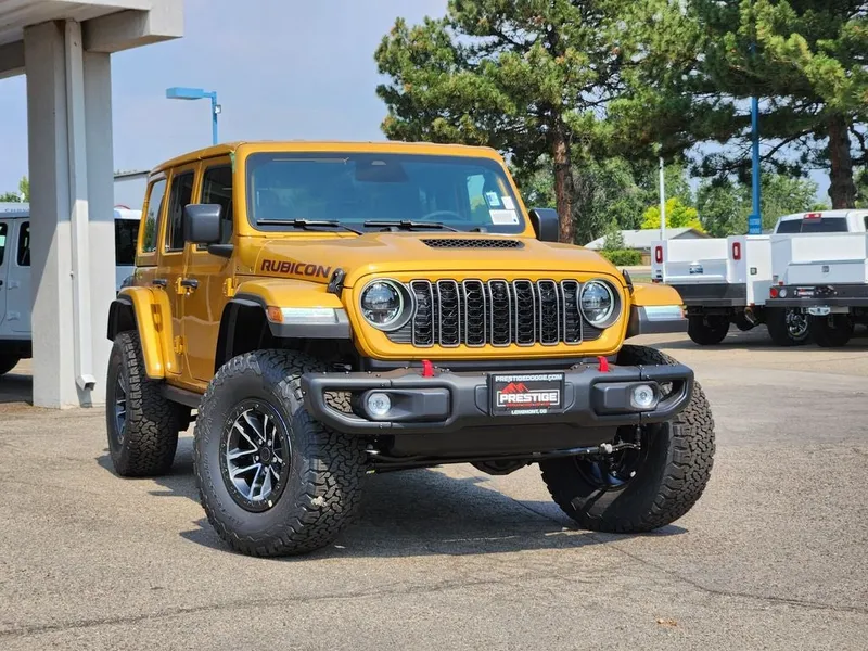 2026 Jeep Wrangler WRANGLER 4-DOOR RUBICON X in Goldilocks Exterior Paint — front three-quarter view