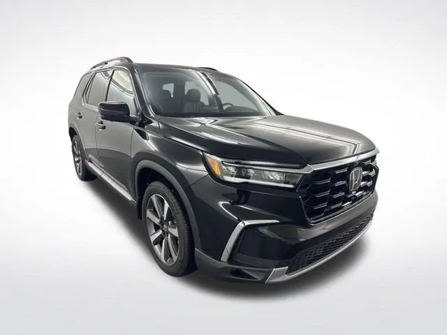 2025 Honda Pilot Elite in Black — front three-quarter view