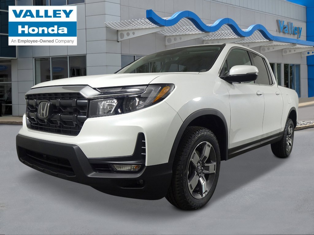 2026 Honda Ridgeline RTL in Platinum White Pearl — front three-quarter view