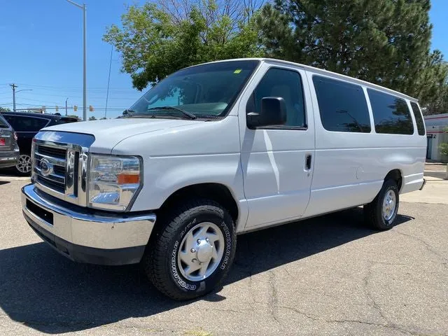 2013 Ford E-350SD XLT in Oxford White — front three-quarter view