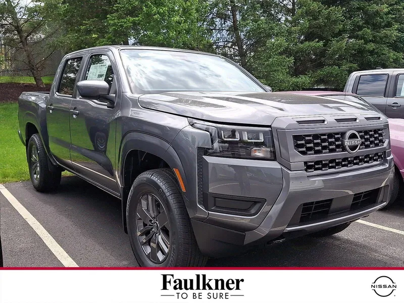2026 Nissan Frontier Crew Cab SV in Gun Metallic — front three-quarter view