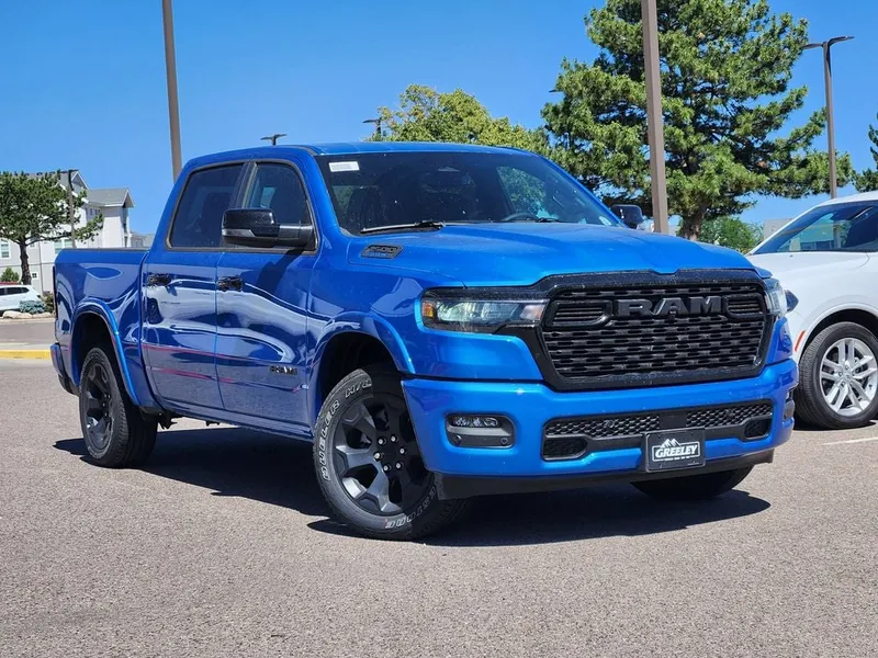 2026 RAM 1500 RAM 1500 BIG HORN CREW CAB 4X4 5'7' BOX in Hydro Blue Pearl-Coat Exterior Paint — front three-quarter view
