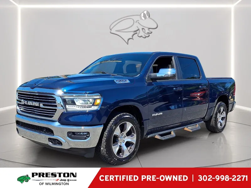 2023 RAM 1500 Laramie in Patriot Blue Pearlcoat — front three-quarter view