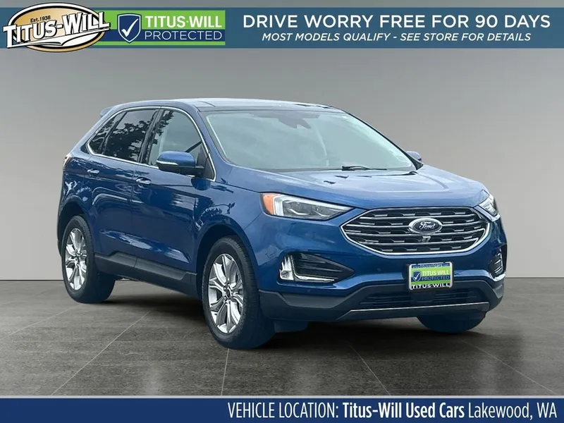 2024 Ford Edge Titanium in Blue Metallic — front three-quarter view