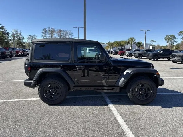 2026 Jeep Wrangler Sport in Black Clearcoat — front three-quarter view
