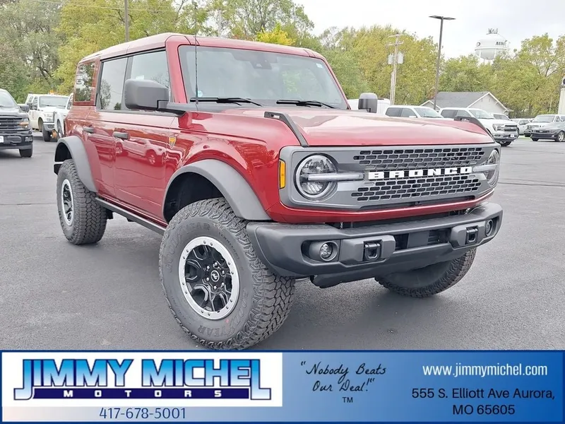 2025 Ford Bronco Badlands in Ruby Red Metallic — front three-quarter view