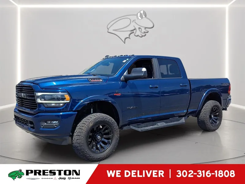 2021 RAM 3500 Laramie in Patriot Blue Pearlcoat — front three-quarter view