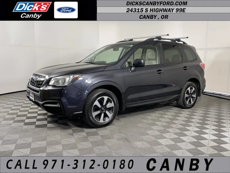2017 Subaru Forester Premium in Dark Gray Metallic — front three-quarter view