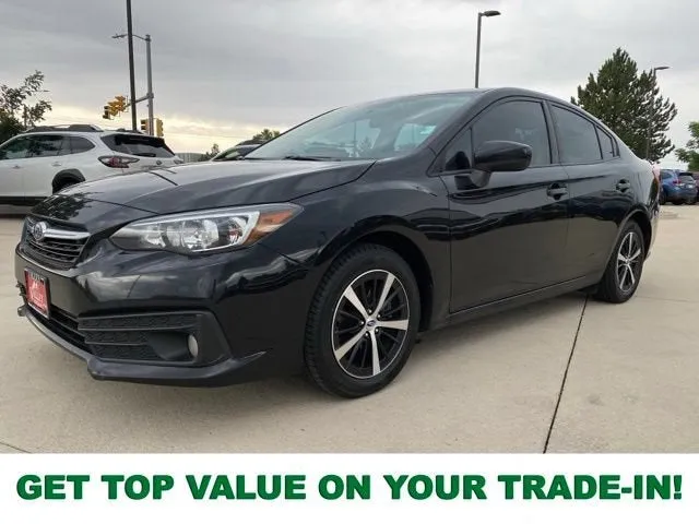 2021 Subaru Impreza Premium in Crystal Black Silica — front three-quarter view