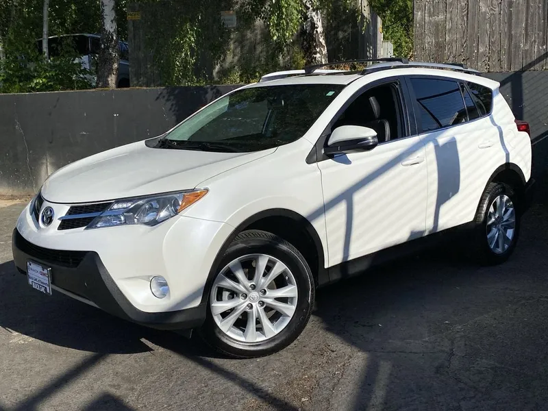 2014 Toyota RAV4 Limited in Wht/White — front three-quarter view