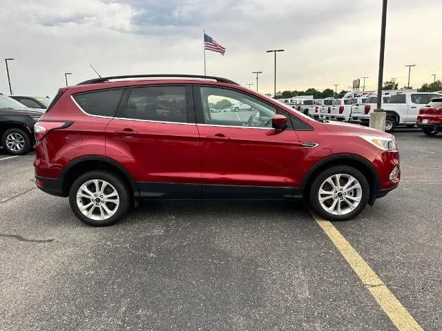 2018 Ford Escape SE in Red — front three-quarter view
