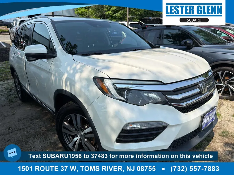 2017 Honda Pilot EX-L in White Diamond Pearl — front three-quarter view