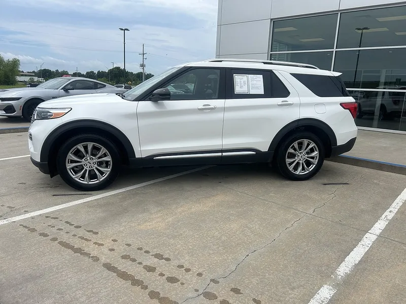 2024 Ford Explorer Limited in Star White Metallic Tri-Coat — front three-quarter view