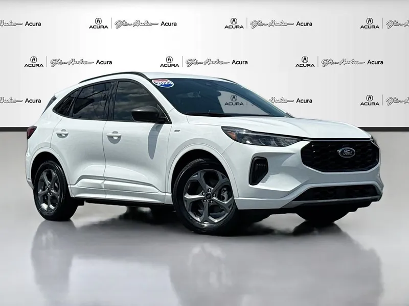 2023 Ford Escape ST-Line in Oxford White — front three-quarter view