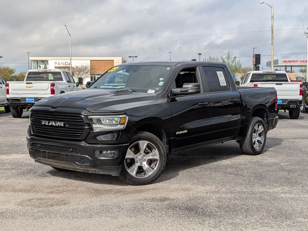 2023 Ram 1500 Laramie in Black — front three-quarter view