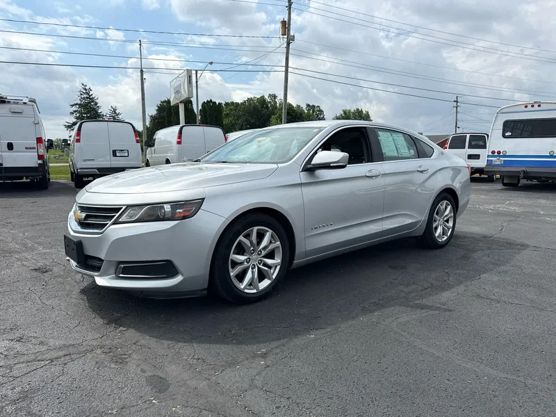 2016 Chevrolet Impala LT in Silver Ice Metallic — front three-quarter view