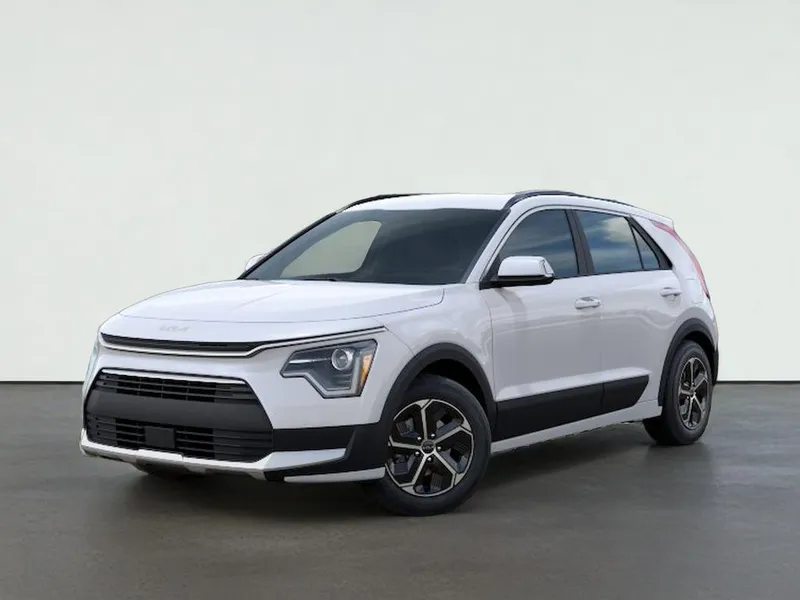 2026 Kia NIRO EX in Snow White Pearl — front three-quarter view