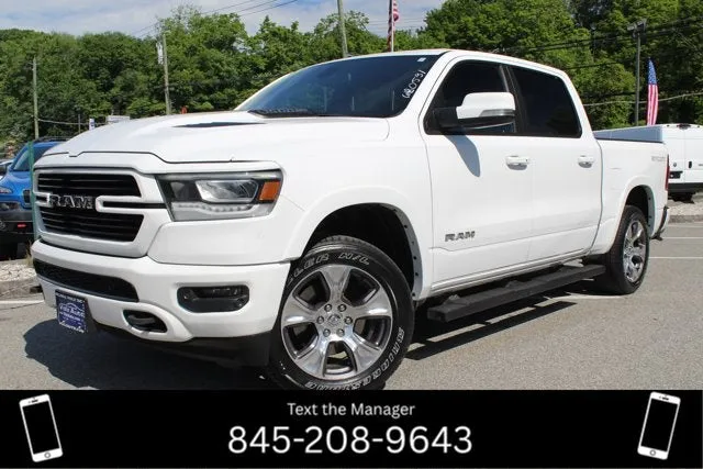 2020 RAM 1500 Laramie in Bright White Clearcoat — front three-quarter view