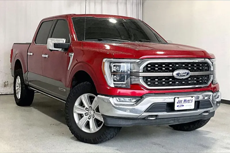 2022 Ford F-150 in Rapid Red Metallic Tinted Clearcoat — front three-quarter view