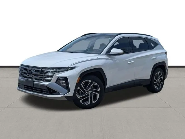 2026 Hyundai TUCSON Limited in White Pearl — front three-quarter view