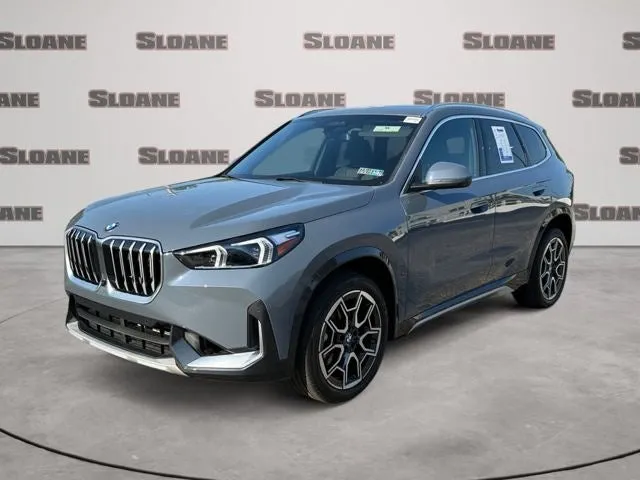 2026 BMW X1 xDrive28i in Storm Bay Metallic — front three-quarter view