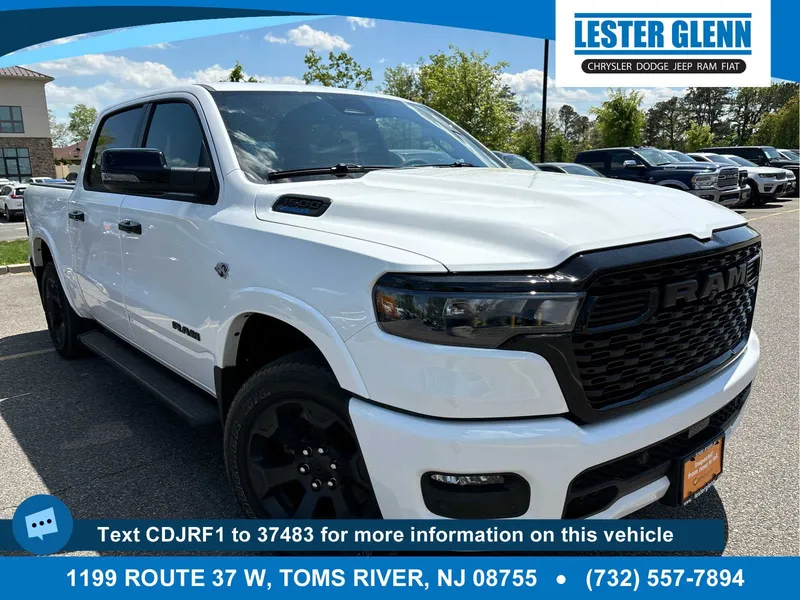 2026 RAM 1500 Big Horn in Bright White Clearcoat — front three-quarter view