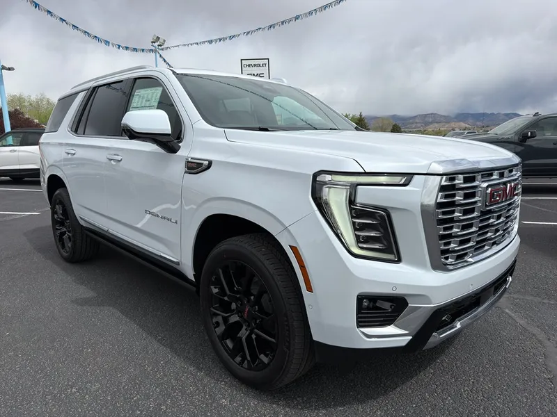 2026 GMC Yukon Denali in Glacier White Tricoat — front three-quarter view