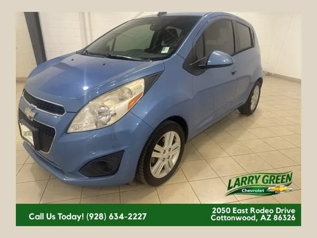 2015 Chevrolet Spark LS in Metallic Paint.) — front three-quarter view