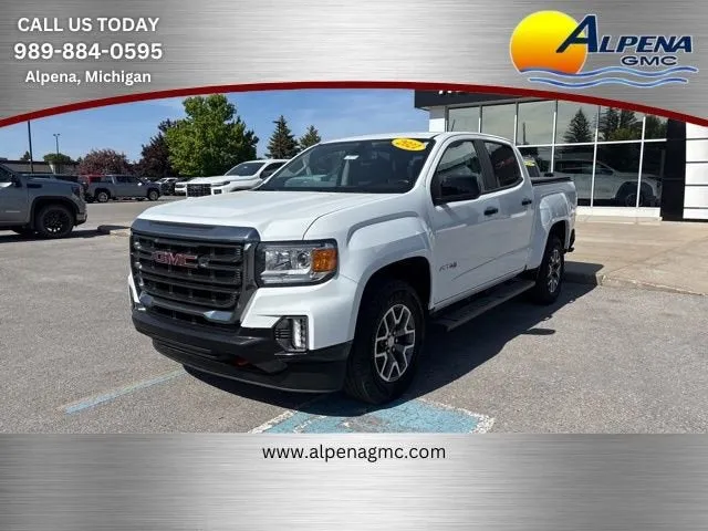 2021 GMC Canyon 4WD AT4 w/Leather in Summit White — front three-quarter view