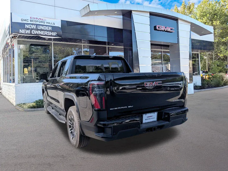 2026 GMC Sierra EV — rear three-quarter view