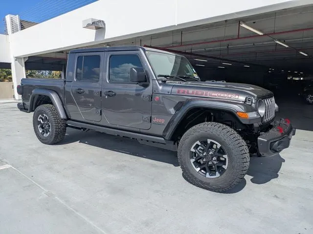 2026 Jeep Gladiator Rubicon X in Granite Crystal Metallic Clear-Coat Exterior Paint — front three-quarter view