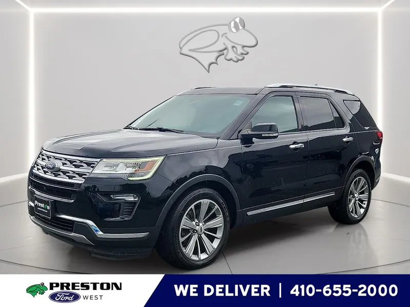 2018 Ford Explorer Limited in Shadow Black — front three-quarter view