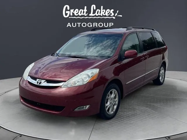 2006 Toyota SIENNA XLE in Salsa Red Pearl — front three-quarter view