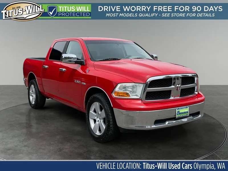 2010 RAM 1500 SLT in Flame Red Clearcoat/Mineral Gray Metallicclearcoat — front three-quarter view
