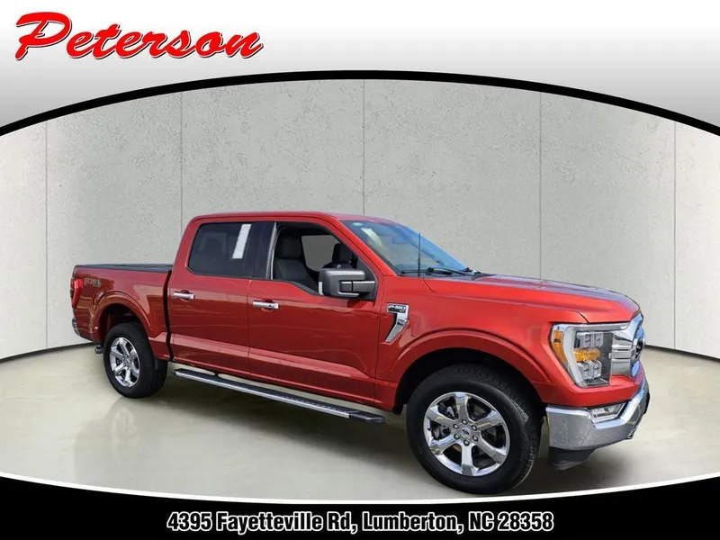 2023 Ford F-150 XLT in Hot Pepper Red Metallic Tinted Clearcoat — front three-quarter view